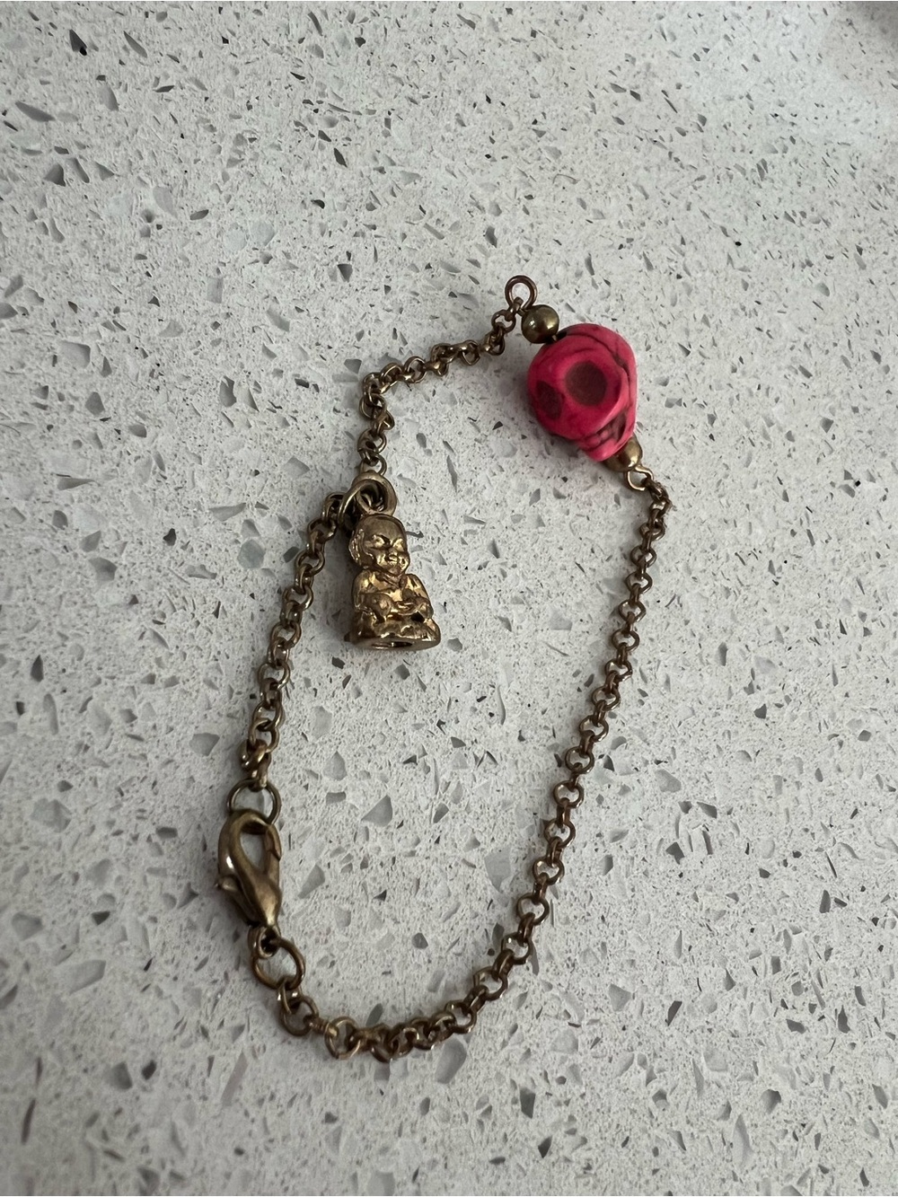 Vintage-Inspired Pink Skull Charm Bracelet with Gold Buddha Accent
